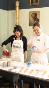 making tiramisù during the best cooking class in rome